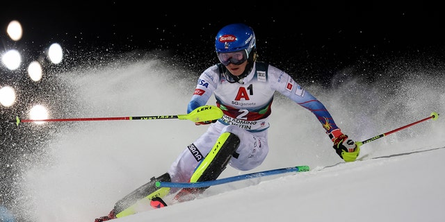 FILE - United States' Mikaela Shiffrin speeds down the course during the first run of an alpine ski women's World Cup slalom, in Schladming, Austria, Jan. 11, 2022. 