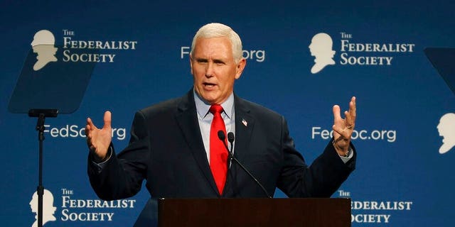 Former Vice President Mike Pence speaks at the Florida chapter of the Federalist Society's annual meeting at Disney's Yacht Club resort in Walt Disney World on Friday, Feb. 4, 2022, in Lake Buena Vista, Fla. 