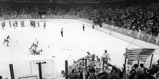 Revelers celebrate Team USA's 4-3 hockey victory over the heavily-favored Soviet Union during the medal round of the 1980 Winter Olympics.(Photo by Tom Sweeney/Star Tribune via Getty Images)