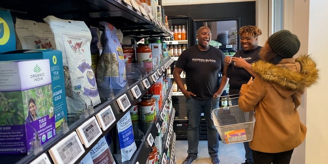 Jilea Hemmings and her husband Jamie opened Nourish + Bloom in January, introducing a high-tech experience that aims to make grocery shopping as simple as possible.
