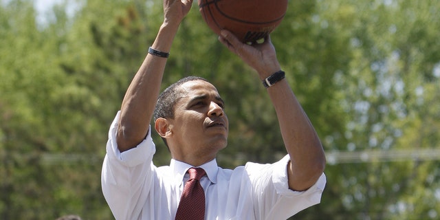 Democratic presidential candidate Barack Obama plays basketball at Riverview High School in Elkhart, Indiana, on May 4, 2008.