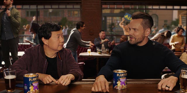 The commercial, "Feed the Debate," asks which way is best to eat mixed nuts — one by one or by the handful.