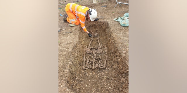 Roman skeleton with head placed between legs uncovered during archaeological excavations at Fleet Marston, near Aylesbury, Buckinghamshire. Excavations took place during 2021.