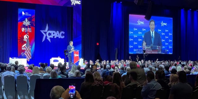 Florida Gov. Ron DeSantis addresses the crowd at the Conservative Political Action Committee (CPAC) in Orlando, Florida on Feb. 24, 2022.