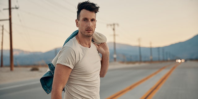 Russell Dickerson told Fox News Digital he "wore out" Usher's 'My Way' album as a fifth-grader.