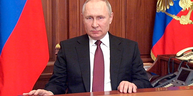 In this image made from video released by the Russian Presidential Press Service, Russian President Vladimir Putin addressees the nation in Moscow, Russia, Thursday, Feb. 24, 2022.