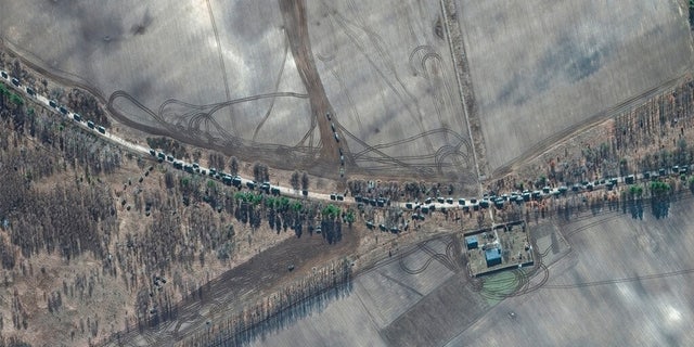 This satellite image provided by Maxar Technologies shows the southern end of a convoy, east of Antonov airport, Ukraine, Monday Feb. 28, 2022. 