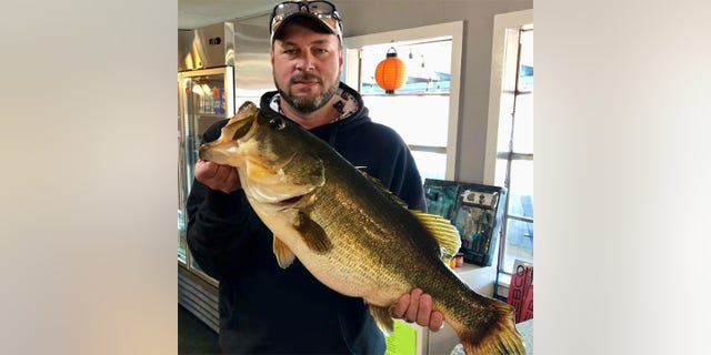 Jonney Smoldas reeled in a 13.34 largemouth bass, this one dubbed ShareLunker 618, at Houston County Lake on Saturday.