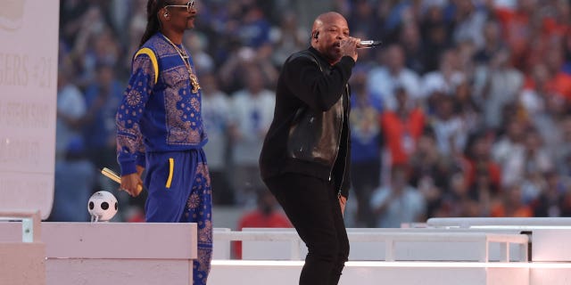 Snoop Dogg performs alongside Dr. Dre at the Super Bowl LVI halftime show.