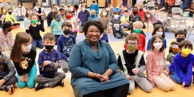 Democratic gubernatorial candidate Stacey Abrams issued a mea culpa for appearing maskless at a Georgia elementary school, posing in photos where everyone but her was following local COVID protocols.