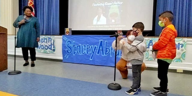 Georgia Democratic gubernatorial candidate Stacey Abrams spoke without a mask to masked students at Glennwood Elementary School in Decatur, Georgia, Friday, Feb. 4, 2022. (Photo: OutKick)