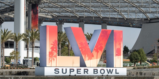 The Super Bowl LVI logo stands outside Sofi Stadium.