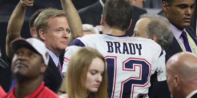 NFL commissioner Roger Goodell speaks to Tom Brady of the New England Patriots after the Patriots defeated the Atlanta Falcons during Super Bowl 51 at NRG Stadium on Feb. 5, 2017, in Houston, Texas. The Patriots won 34-28.