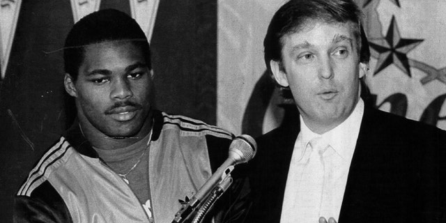 Team owner Donald Trump announces he has signed Herschel Walker to play running back for the New Jersey Generals in New Jersey. Walker played for the Generals from 1983-85.