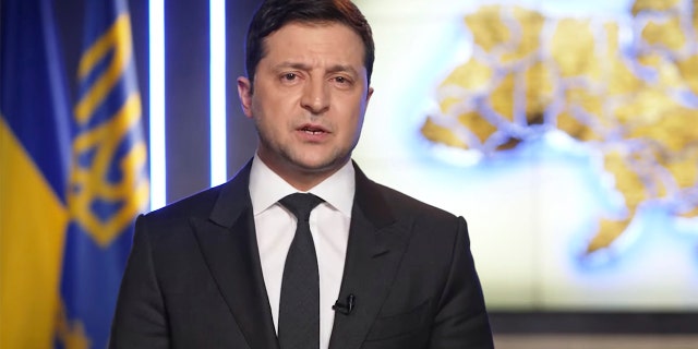 In this handout photo taken from video provided by the Ukrainian Presidential Press Office, Ukrainian President Volodymyr Zelenskyy addresses the nation in Kyiv, Ukraine, Thursday, Feb. 24, 2022. (Ukrainian Presidential Press Office via AP)