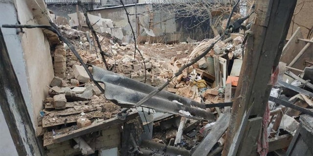 A view shows a residential building which Ukrainian local authorities said was damaged by shelling, in the town of Vrubivka, Lugansk region, Ukraine, in this photo released on February 17, 2022. Press service of the Ukrainian national police in the Luhansk region/Handout via REUTERS