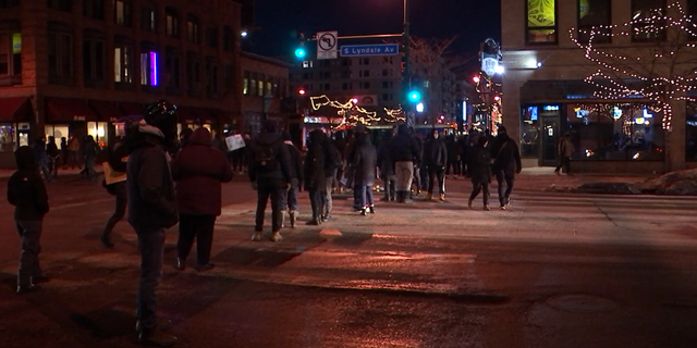 Protesters in Minneapolis vandalized buildings and blocked traffic on Friday night while demanding for justice in the wake of Amir Locke's death, who was shot by police officers during a no-knock warrant.