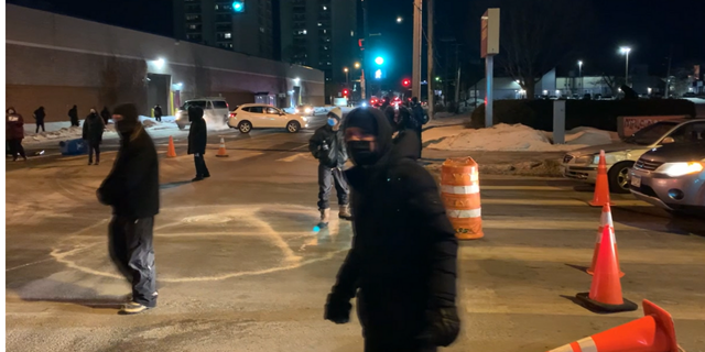 Protesters in Minneapolis vandalized buildings and blocked traffic Friday night while demanding justice in the wake of the death of Amir Locke, who was shot dead by police while on a no-knock warrant.