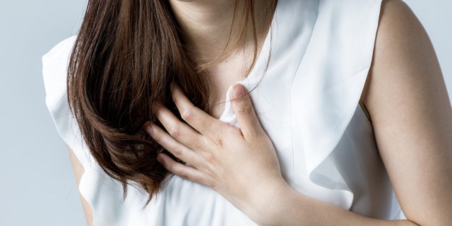 COVID-19 pandemic causes 'broken heart' syndrome cases to surge: researchers 3 A woman experiences chest pain.