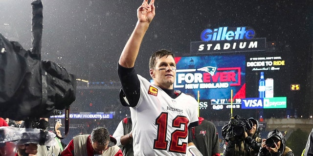 Tom Brady hints at possible return to the NFL: 'Never say never' 5 FOXBOROUGH, MASSACHUSETTS - OCTOBER 03: Tom Brady # 12 of the Tampa Bay Buccaneers waves to the crowd as he runs off the field after defeating the New England Patriots in the game at Gillette Stadium on October 03, 2021 in Foxborough, Massachusetts. (Photo by Adam Glanzman / Getty Images)