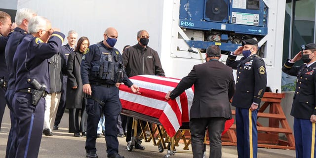 Alameda County Sheriff’s Office command staff honor Sheriff’s Recruit David Nguyen and support his family as he was taken from the coroner’s bureau in the city of Oakland to a mortuary in Colma. Services for Nguyen were held on Monday, Jan. 24, 2022.