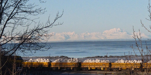 An Alaska Railroad train carries tons of snow in Anchorage, Alaska, on Thursday, March 3, 2016, after traveling 360 miles south from Fairbanks. A Russian lawmaker is demanding the United States return Alaska and a California fort amid crippling sanctions against Moscow.