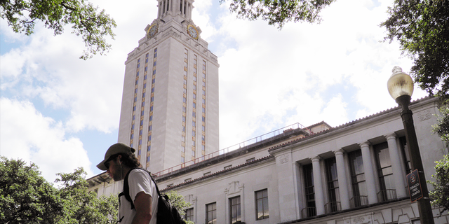 A student is shown walking along the campus at the University of Texas in Austin, Texas. People from San Antonio, Austin and Houston all travel to the Texas Hill Country, said one resident of this part of the state.