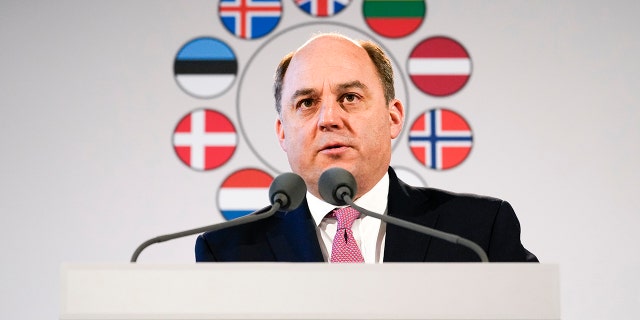 Britain's Defense Secretary Ben Wallace delivers somber comments Tuesday as he opens a conference of defense ministers at Belvoir Castle, Leicestershire, England in on Feb. 22, 2022.