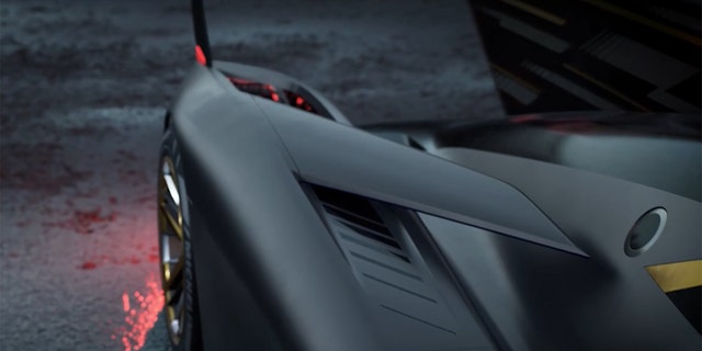 The Cadillac GTP features four fin-like aerodynamic elements extending from its fenders.