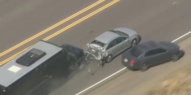 The stolen party bus crashed into a four-door sedan on Sierra Highway and came to a stop.