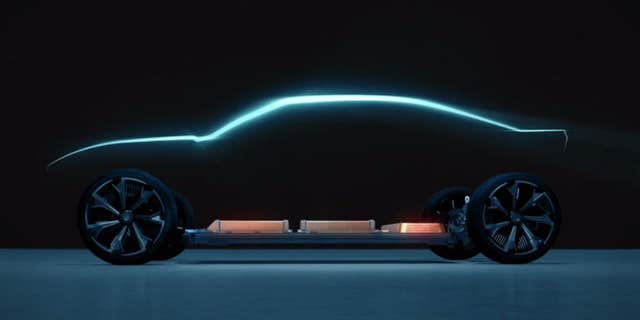 GM has teased an electric sports car similar to the Chevrolet Camaro.