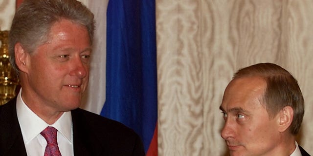 Russian President Vladimir Putin (R) looks at U.S. President Bill Clinton (L) before the start of their second meeting June 4 in Catherine's Hall in the Kremlin. (WM)