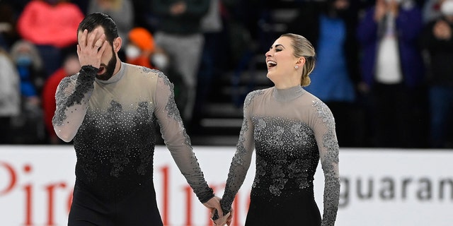 Timothy LeDuc and Ashley Cain-Gribble compete in the pairs free skate program during the U.S. Figure Skating Championships Saturday, Jan. 8, 2022, in Nashville, Tennessee.