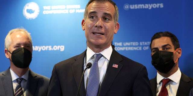 FILE - Los Angeles Mayor Eric Garcetti speaks during a news conference at the 90th Winter Meeting of United States Conference of Mayors (USCM) on January 19, 2022, in Washington, DC. 