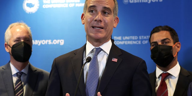 FILE - Los Angeles Mayor Eric Garcetti speaks during a news conference at the 90th Winter Meeting of United States Conference of Mayors (USCM) on January 19, 2022, in Washington, DC. 