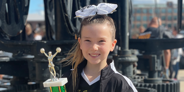 Maci Young of N.J. recently competed down in Florida with her local cheer squad. The team took third place in the competition — and did not have to wear masks in Orlando, Florida.