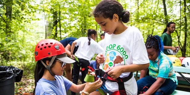 Troop 6000 which serves girls in the New York City Shelter System. 