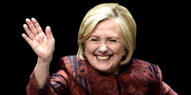 Hillary Clinton waves to the audience before "An Evening with President Bill Clinton and former Secretary of State Hillary Rodham Clinton" at Park MGM on May 5, 2019.