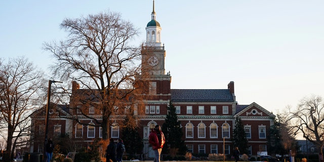 Students walk on the campus of Howard University, one of six historically Black colleges and universities (HBCUs) across the United States that received bomb threats, in Washington, U.S. January 31, 2022.