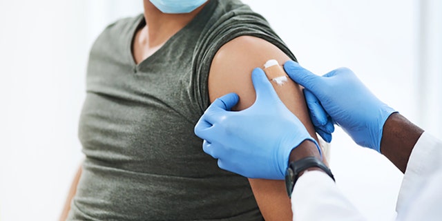 A patient receives a vaccine.  