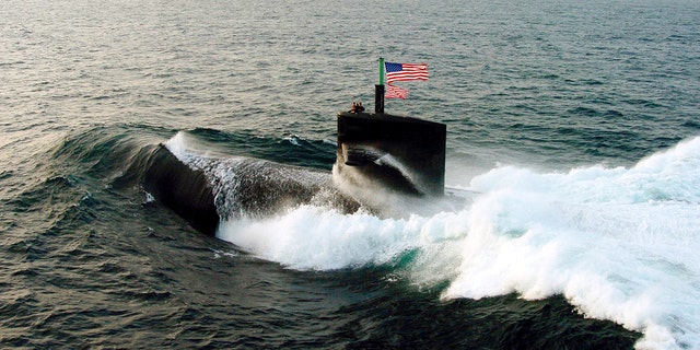 The USS Albuquerque SSN-706 participates in a photo-exercise Sept. 10, 2006 in the North Arabian Sea. The submarine in question is not pictured. 