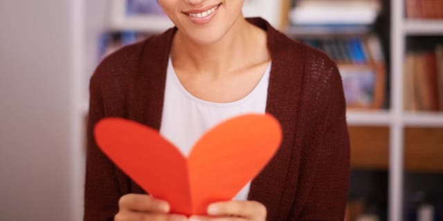 Valentine's Day scratch-off card recipients can read their hidden messages when they use a coin to scratch off the soap and paint layer.