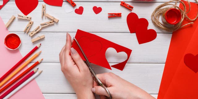 TikTok user Lauren Campanella’s scratch-off Valentine’s Day card idea helps DIY crafters make interactive holiday stationery with construction paper, stickers, pencils, markers, paint, liquid dish soap and white crayon.