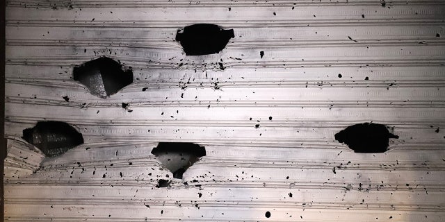 A damaged door is pictured on February 3, 2022 following an overnight raid by US special operations forces against suspected jihadists in Syria's northwestern province of Idlib. (Photo by ABDULAZIZ KETAZ/AFP via Getty Images)