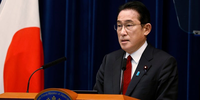 Japan's Prime Minister Fumio Kishida speaks during a press conference in Tokyo Friday, Feb. 25, 2022, the day Japan announced additional sanctions against Russia in response to its attacks on Ukraine. (Rodrigo Reyes Marin/Pool Photo via AP)