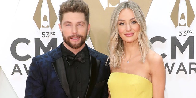 Chris Lane and Lauren Bushnell attend the 53nd annual CMA Awards at Bridgestone Arena on November 13, 2019 a Nashville, Tennessee.