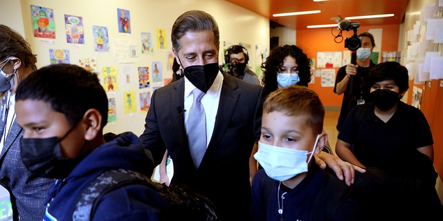 Superintendent Alberto M. Carvalho, Los Angeles Unifed School District, shown with students as he tours Maywood Center For Enriched Studies (MaCES) Magnet school on Wednesday, Feb. 16, 2022 in Maywood, CA. (Gary Coronado / Los Angeles Times via Getty Images)