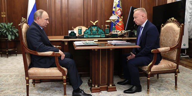 Dmitry Mazepin (R) met with President Vladimir Putin (L) in January in his role as  CEO of Uralchem, which holds a controlling stake in Haas F1 sponsor Uralkali.