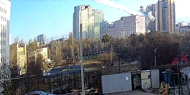 Surveillance footage shows a missile hitting a residential building in Kyiv, Ukraine, February 26, 2022, in this still image taken from a handout video. 