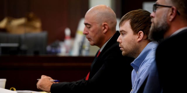 Travis Reinking listens during the victim impact statements at Justice A.A. Birch Building in Nashville, Tenn., Saturday, Feb. 5, 2022. 